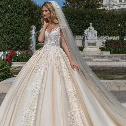 Vintage cap sleeve luxury ball gown wedding dress by EdleessFashion, featuring elegant design and intricate detailing.
