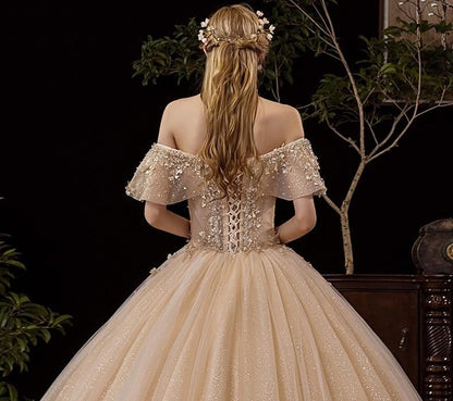Shiny vintage off-shoulder wedding gown with crystal bead embellishments by EdleessFashion, luxurious bridal dress image.