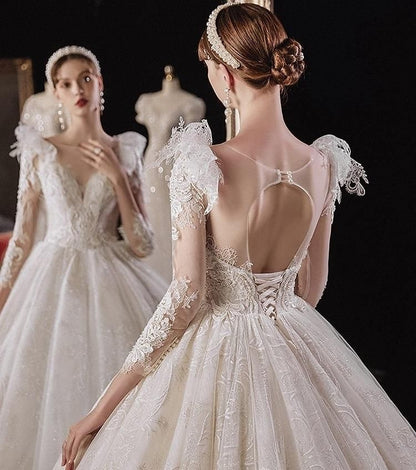 Elegant princess wedding dress with shiny pearls by EdleessFashion, featuring intricate details and flowing fabric for a luxurious look.