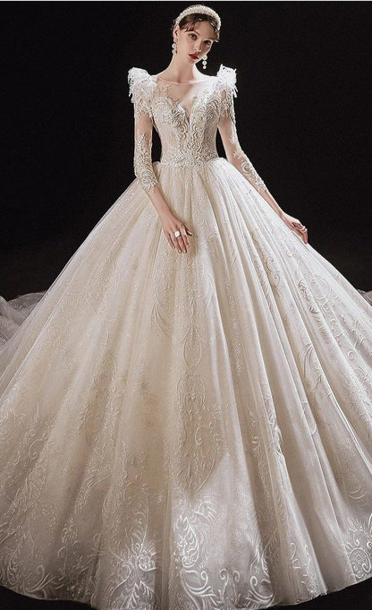 Luxurious EdleessFashion princess wedding gown with shiny pearls, elegant design, and intricate detailing for special occasions.