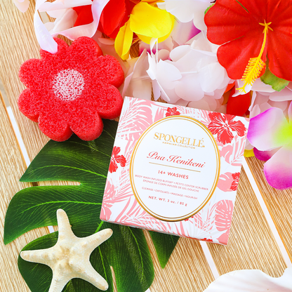 Hawaiian Pua Kenikeni body wash infused buffer by Spongellé with a textured sponge surface and tropical floral design.