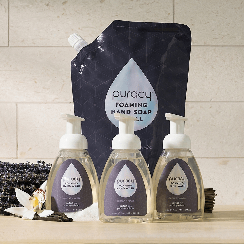 Set of three Puracy foaming hand soap bottles with lavender vanilla scent, featuring clean, modern packaging.