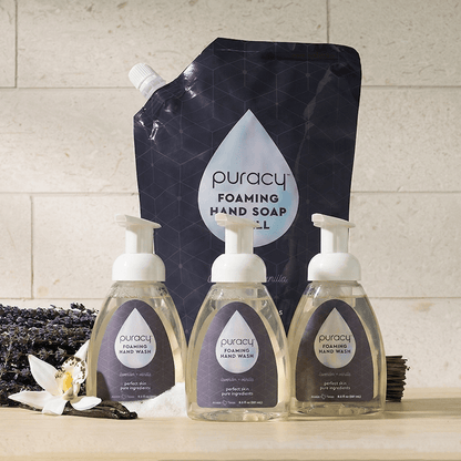 Set of three Puracy foaming hand soap bottles with lavender vanilla scent, featuring clean, modern packaging.