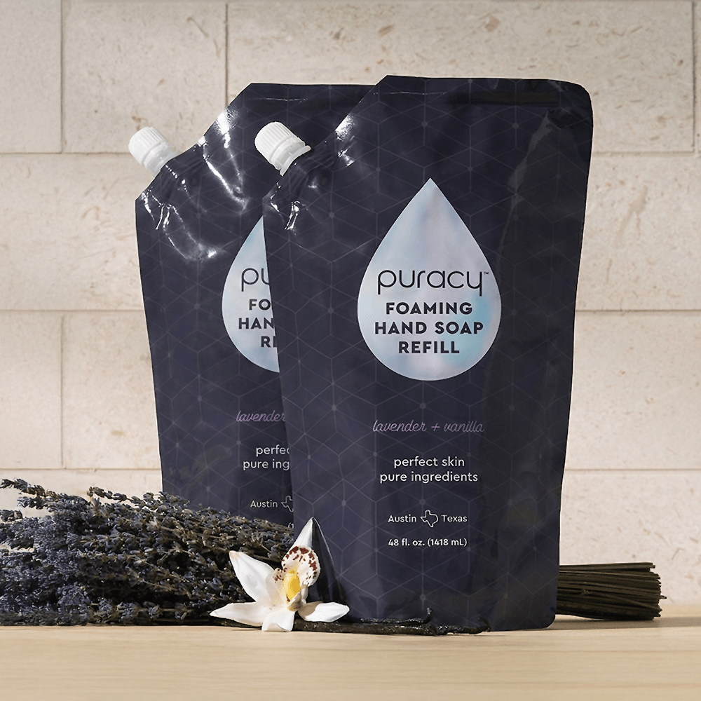 Set of three Puracy foaming hand soap bottles with lavender vanilla scent, featuring clear containers and pump dispensers.