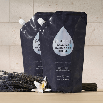 Set of three Puracy foaming hand soap bottles with lavender vanilla scent, featuring clear containers and pump dispensers.
