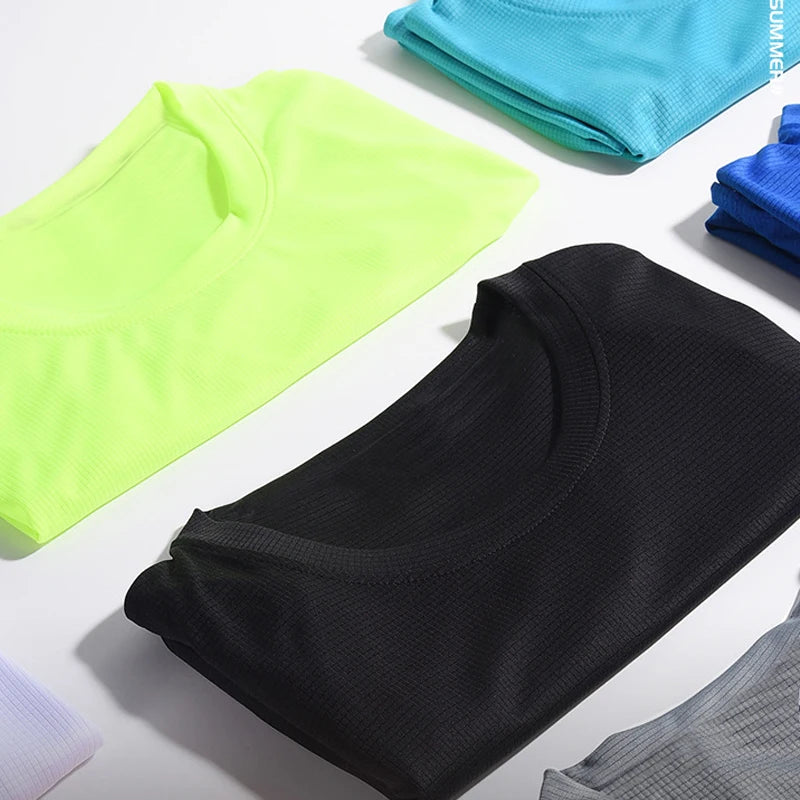 Green men's bodybuilding shirt from Pure Fitness Store, short sleeve quick-dry sports gym t-shirt for summer workouts.