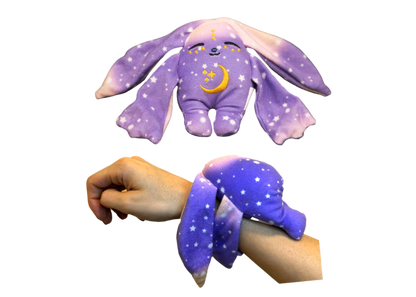 Purple Moon Pals Polli Mini Wrist Hugger Plush featuring a soft, cuddly design perfect for wrist comfort and playful style.