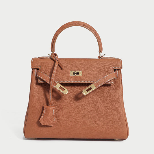 Cilela Queens Mini Top Handle Palm-Grain Calfskin Bag with structured leather design and turn-lock closure in brown.