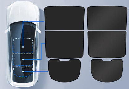 Tesla Model Y rear liftgate sunshade by Tesery Official Store, showing the dark fabric sunshade installed in the vehicle's rear liftgate area.