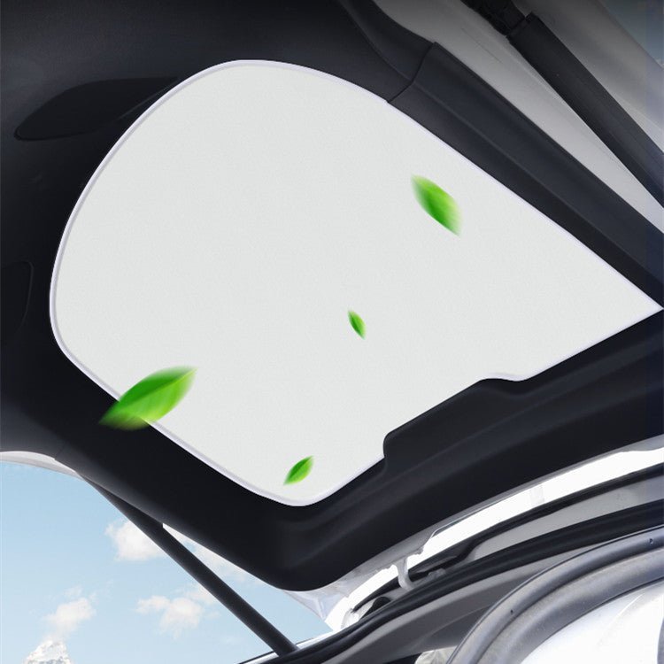 Tesla Model Y rear liftgate sunshade by Tesery Official Store, showing a black fabric sunshade installed on the vehicle's rear liftgate.