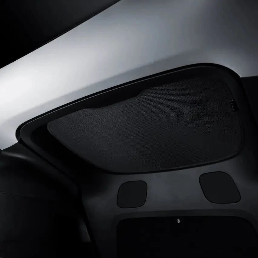 Tesla Model Y rear liftgate sunshade by Tesery Official Store, showing the mesh sunshade installed on the liftgate.