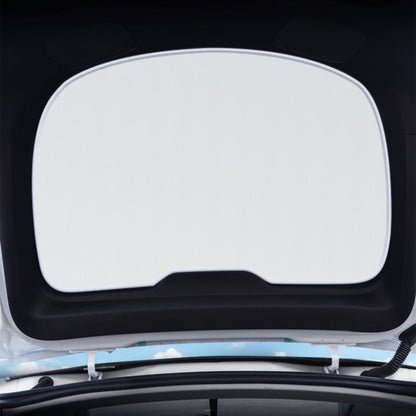 Tesla Model Y rear liftgate sunshade by Tesery Official Store, showing a dark tinted sunshade installed in the vehicle's rear liftgate area.