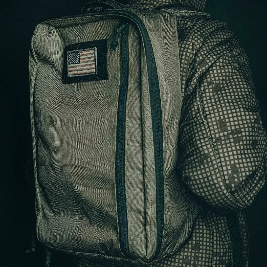 Black Recycled Firefighter 24 Hour Backpack with multiple compartments and sturdy straps for daily use and outdoor adventures.