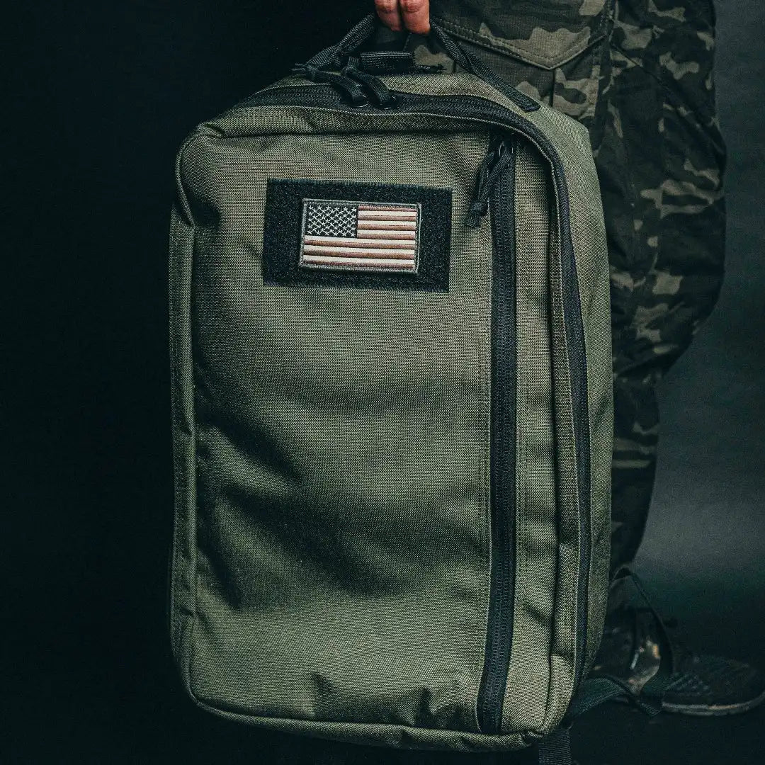 Black Recycled Firefighter 24 Hour Backpack with multiple compartments and sturdy straps for daily use and outdoor activities.