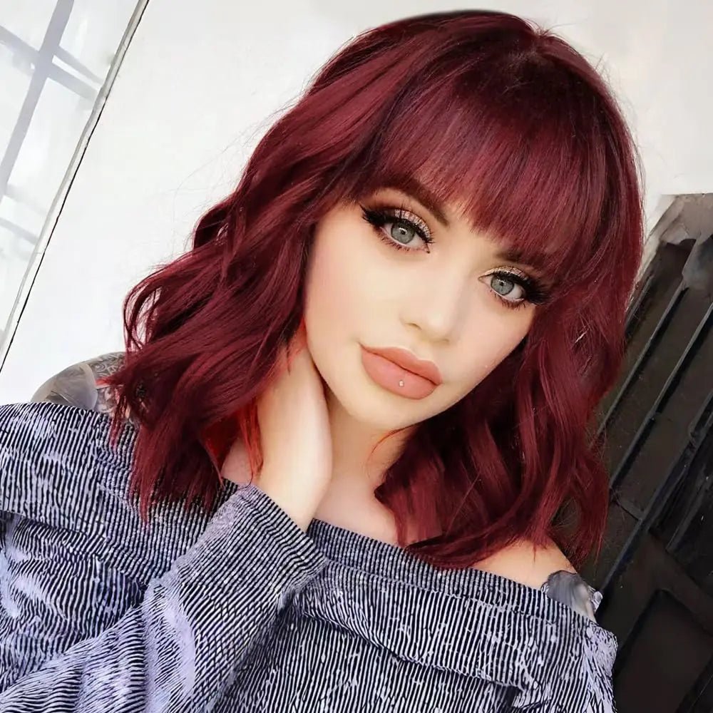 RemyAeki Short Wavy Red Wigs with Bangs for Women Curly Bob Wigs Shoulder Length Burgundy Wine Red Wigs for White Women Synthetic Heat Resistant Fiber Bangs Wigs Medium Length 14 Inch.