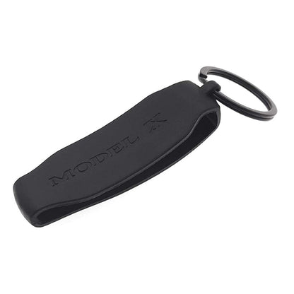 Silicone key fob cover with metal buckle for Tesla Model S and X, provides scratch protection and OEM quality.