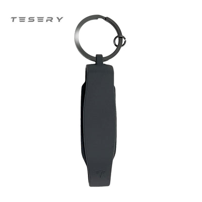 Silicone key fob cover for Tesla Model S and X with metal buckle, offers scratch protection and OEM-quality fit.