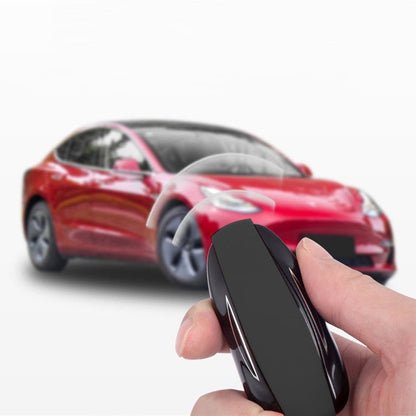 Silicone key fob cover for Tesla Model S and X with metal buckle, offers scratch protection and OEM quality.