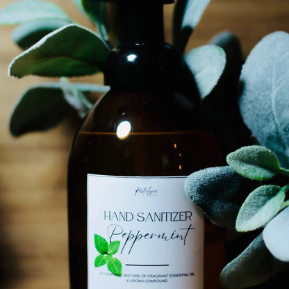 Restalgic Atelier natural organic foaming hand sanitizer in 16oz bottle with orange, peppermint, and bergamot scent.