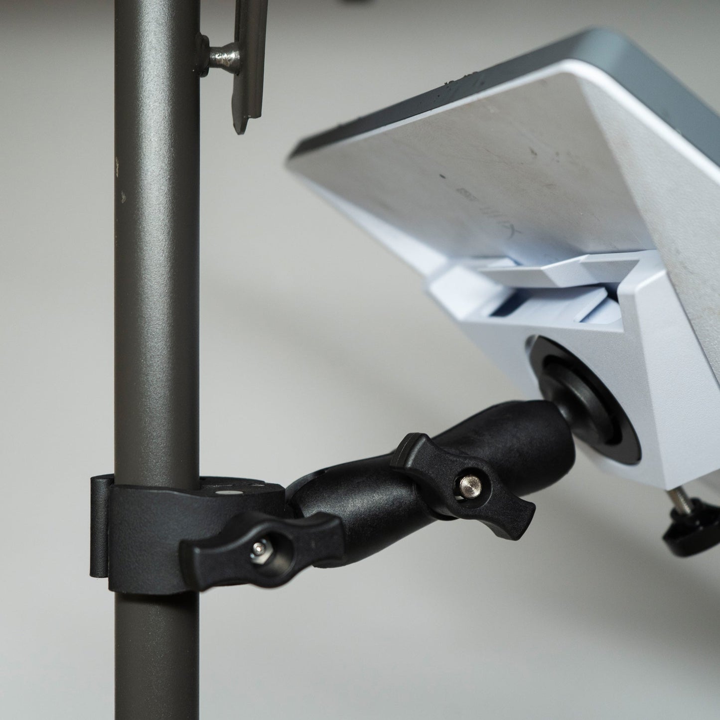 Revolink Satellite Gear Starlink Mini Bar Clamp Mount attached to a satellite dish for secure positioning and stability.