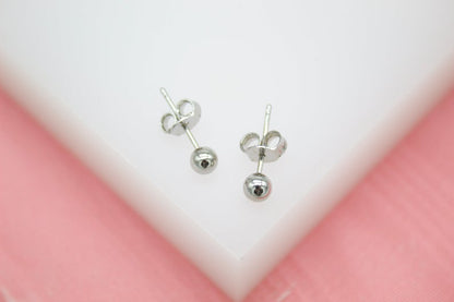 Rhodium-plated 18K gold filled tiny ball stud earrings by MIA Jewelry, small size, perfect for everyday wear.