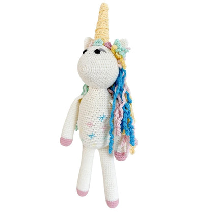 Handmade organic cotton stuffed animal of Rose the Unicorn, a soft and adorable plush toy by Bebemoss.