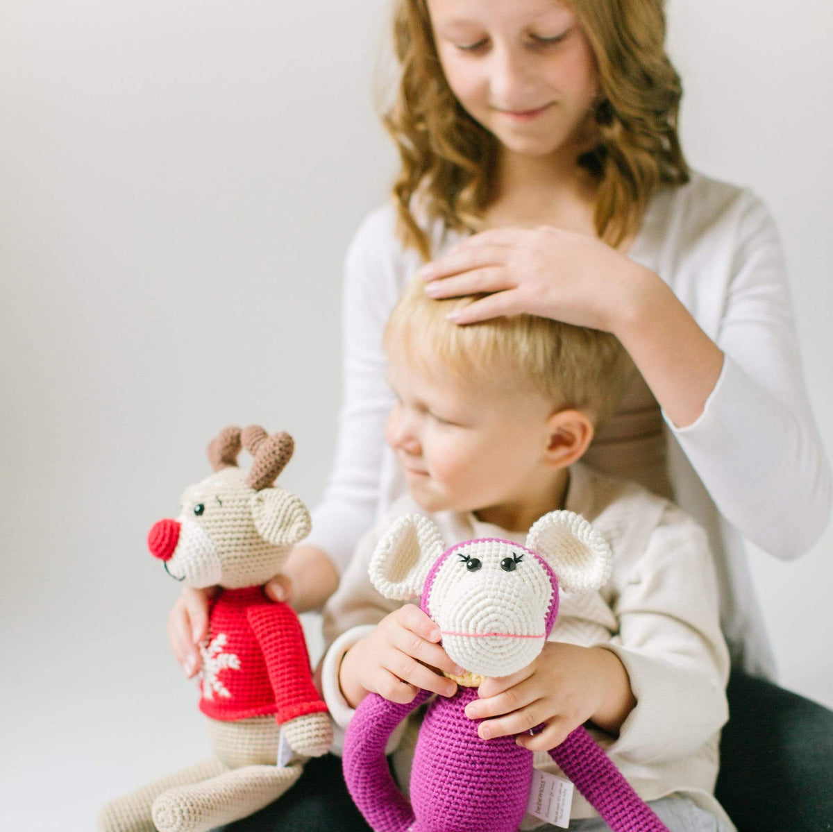 Handmade organic cotton Ruddy the Reindeer stuffed animal by Bebemoss, soft and cuddly toy for children.
