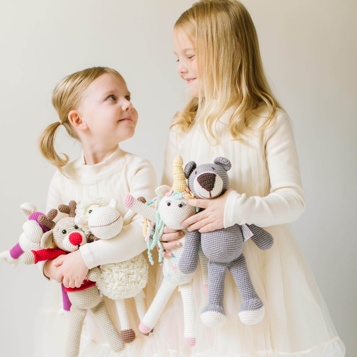 Handmade organic cotton stuffed reindeer toy named Ruddy by Bebemoss, featuring soft fabric and detailed antlers.