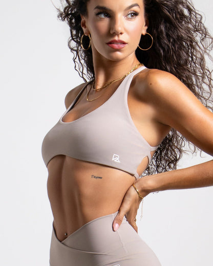 Women's Taupe Hot Girl Strappy Sports Bra by Runner's Athletics with open back, scoop neckline, and medium support for active wear.