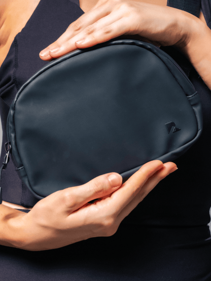 Black LuxeGo Small Crossbody Sling Bag by Runner's Athletics with adjustable strap and minimalist design.