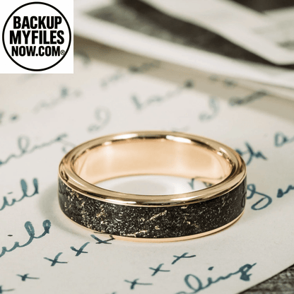 Men's gold wedding band with meteorite and gold flakes, featuring a 3mm width in 10K yellow gold from Rustic and Main.