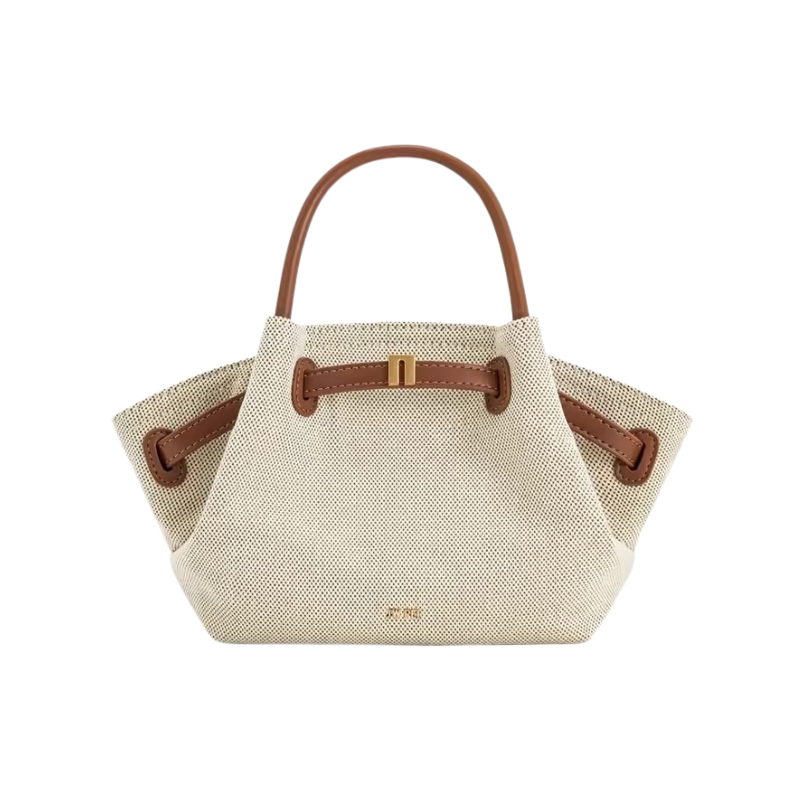 Brown women's canvas mini crossbody shoulder bag by OBA, showing compact design and adjustable strap.