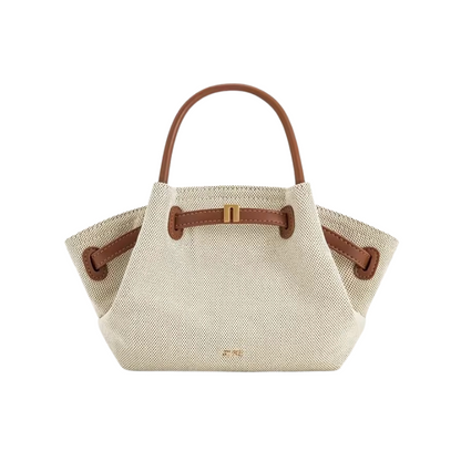 Brown women's canvas mini crossbody shoulder bag by OBA, showing compact design and adjustable strap.
