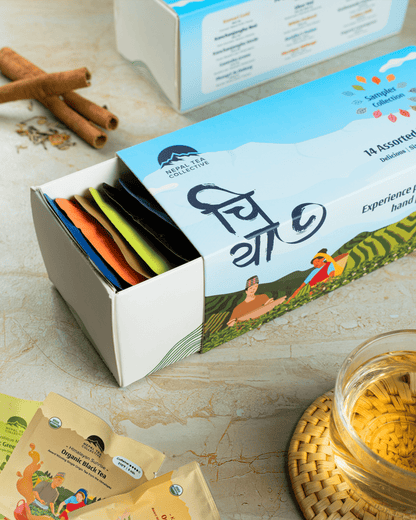 Assorted organic Nepal Tea sampler bundle featuring various tea leaves in a decorative box, showcasing the Nepal Tea brand.