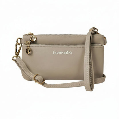 Creamy spice taupe Bella RFID wallet by SaveTheGirls with gold hardware, featuring sleek design and RFID protection.