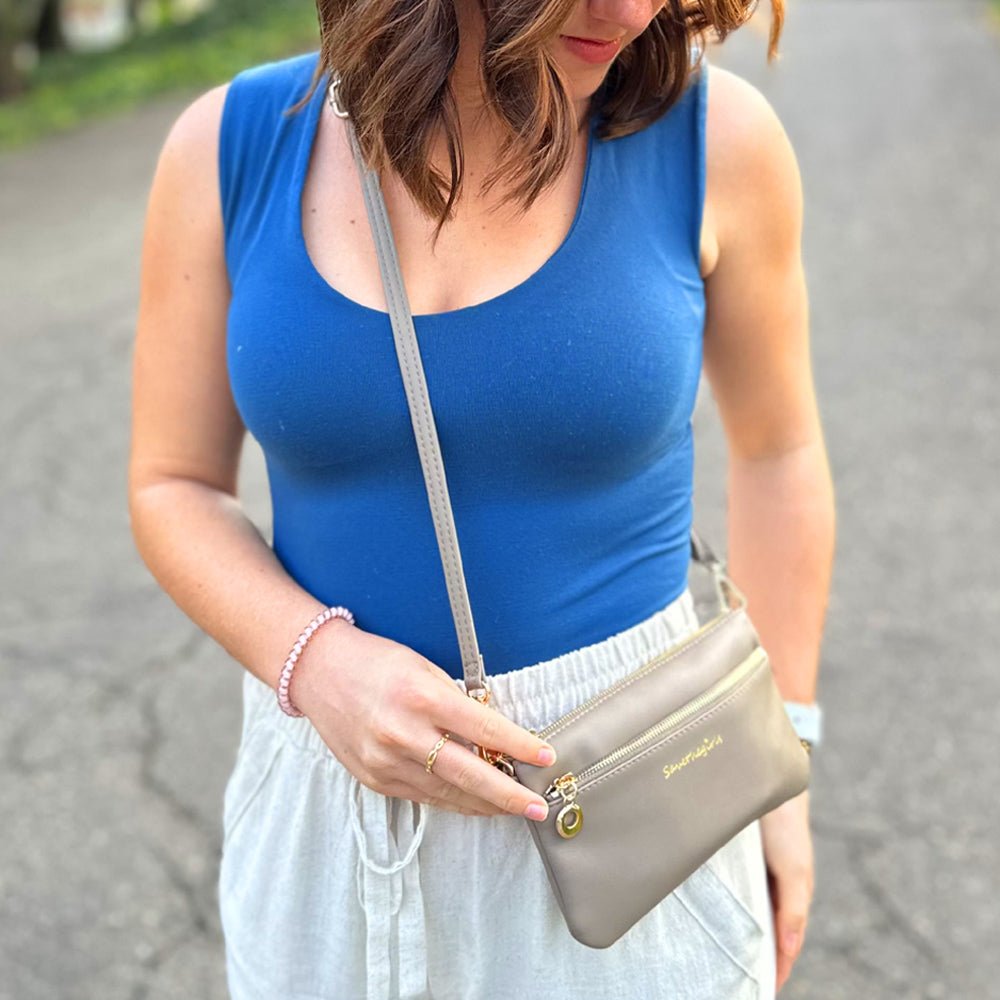 Creamy spice taupe Bella RFID wallet by SaveTheGirls with gold hardware and RFID protection.