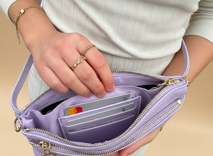 Creamy spice taupe Bella RFID wallet by SaveTheGirls with gold hardware, showcasing its sleek design and secure RFID features.