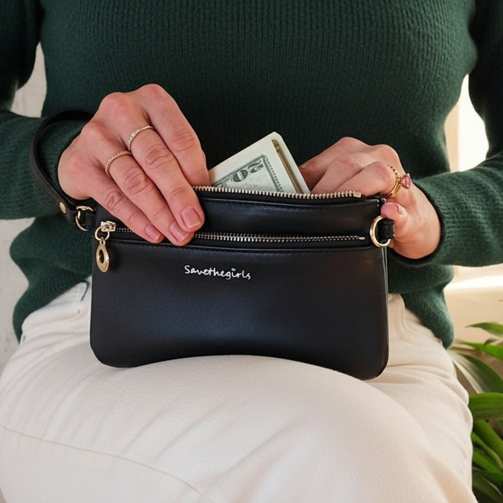 Creamy spice taupe Bella RFID wallet by SaveTheGirls with gold hardware, showcasing its sleek design and compact size.