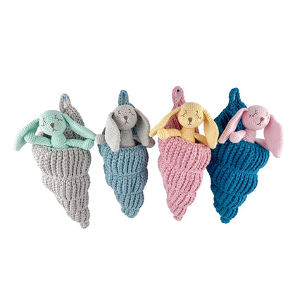 Handmade sea shell basket stuffed animal toy made from organic cotton by Bebemoss, designed for children.