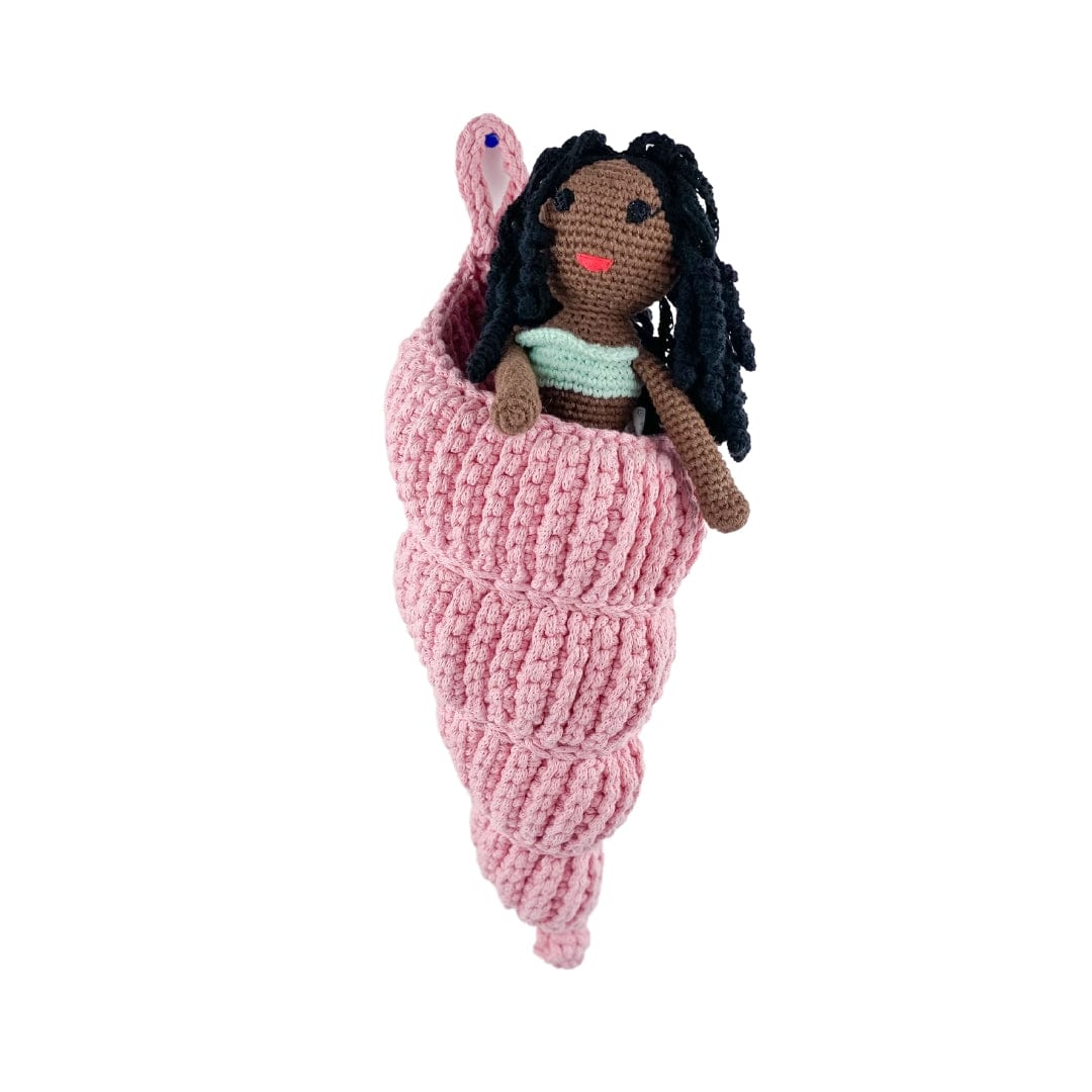 Handmade stuffed sea shell basket toy made of organic cotton by Bebemoss, designed as a soft, decorative animal for children.