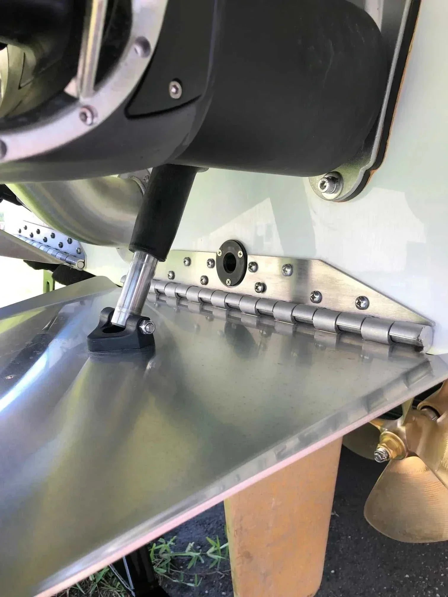 Seaview Global Vault Pro drain plug with durable design, shown in use on a boat's hull for water drainage.