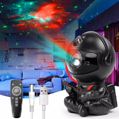 Shaketea astronaut night light projector featuring a black astronaut figure with starry night images for aesthetic room decor.
