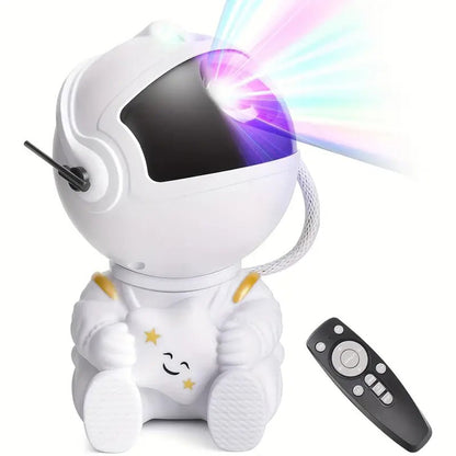 Shaketea astronaut night light projector with black guitar design, projecting starry night images for aesthetic room decor.