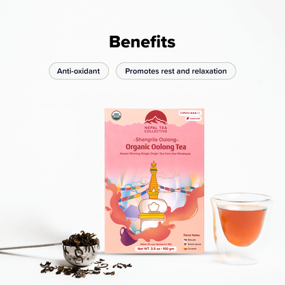 Organic Shangri-La Oolong tea leaves from Nepal Tea in a clear glass jar with dried tea leaves visible.