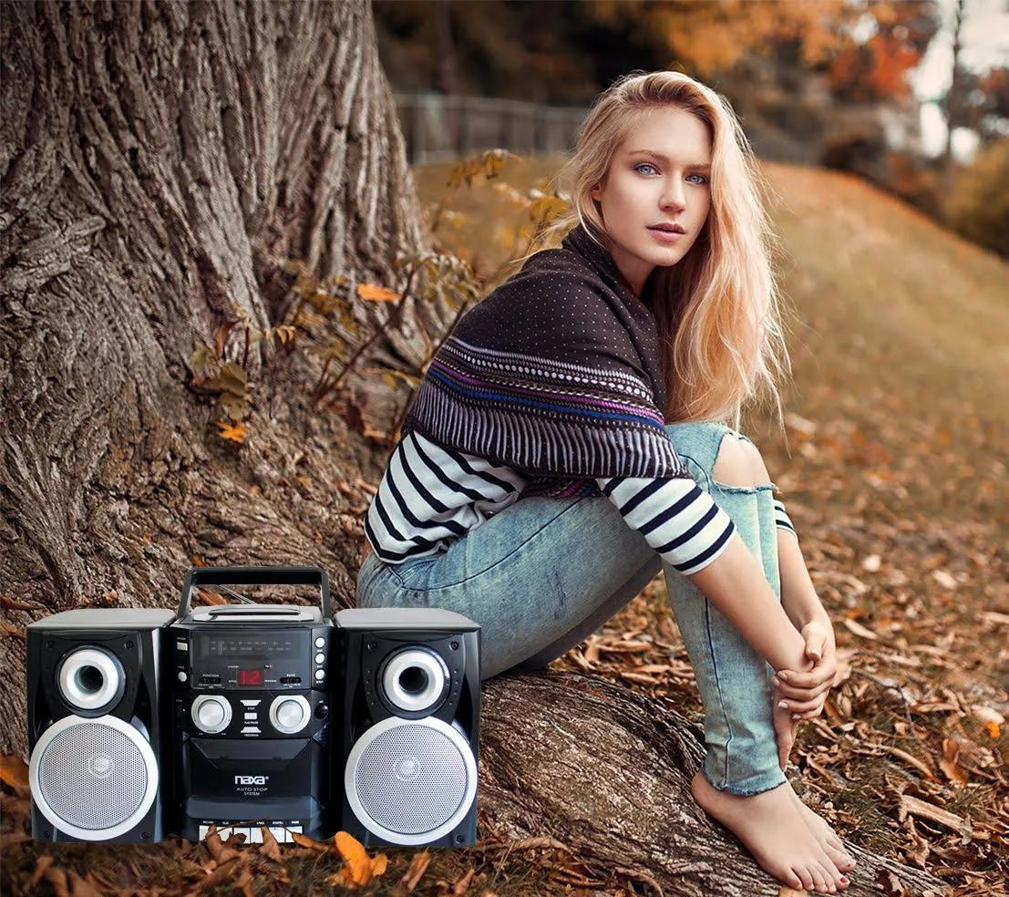 Naxa portable CD player with AM/FM stereo radio and cassette recorder, showing controls and display on a compact device.