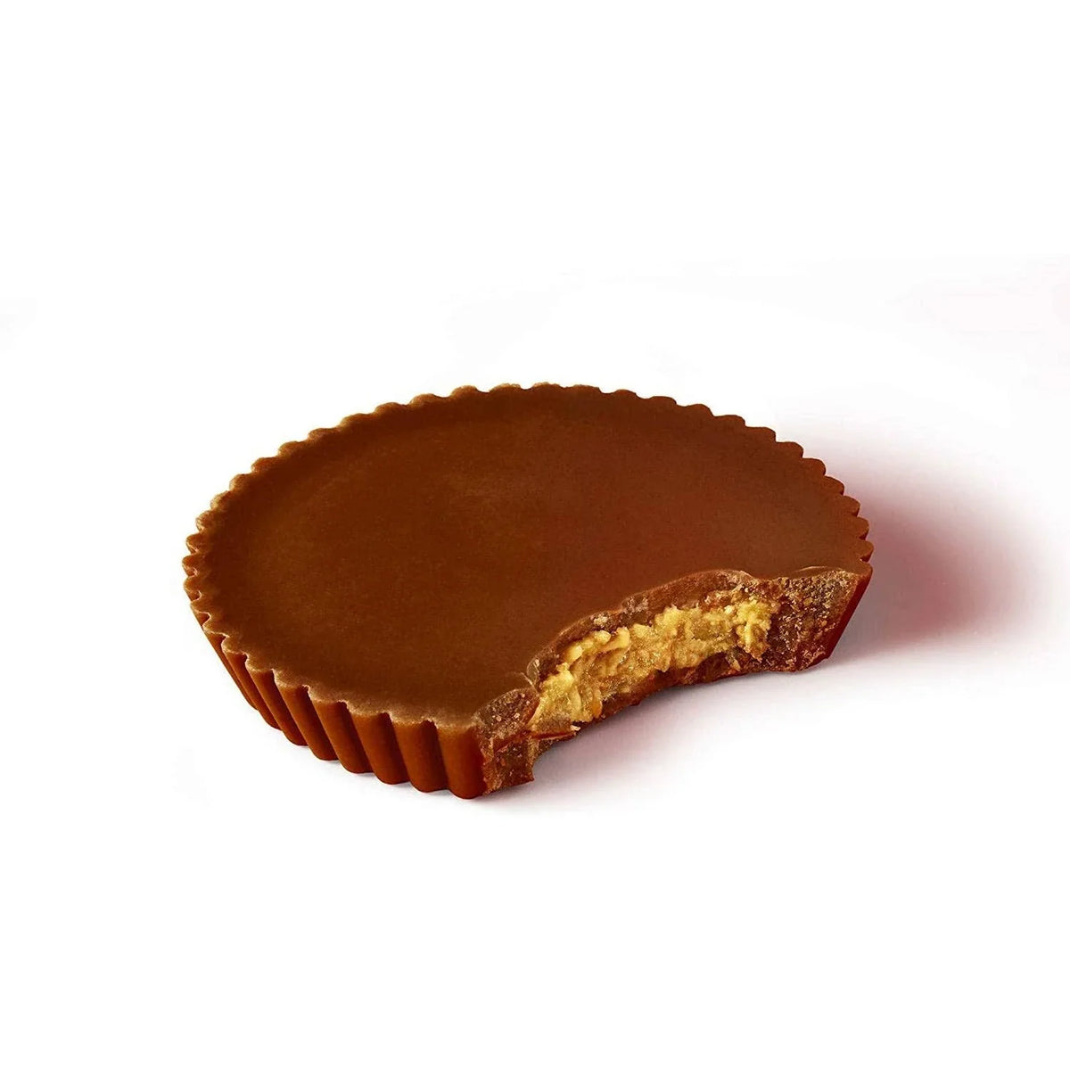 Reese's Peanut Butter Cup Thins Milk Chocolate candy in a package, showcasing the thin, smooth milk chocolate coating with peanut butter filling.