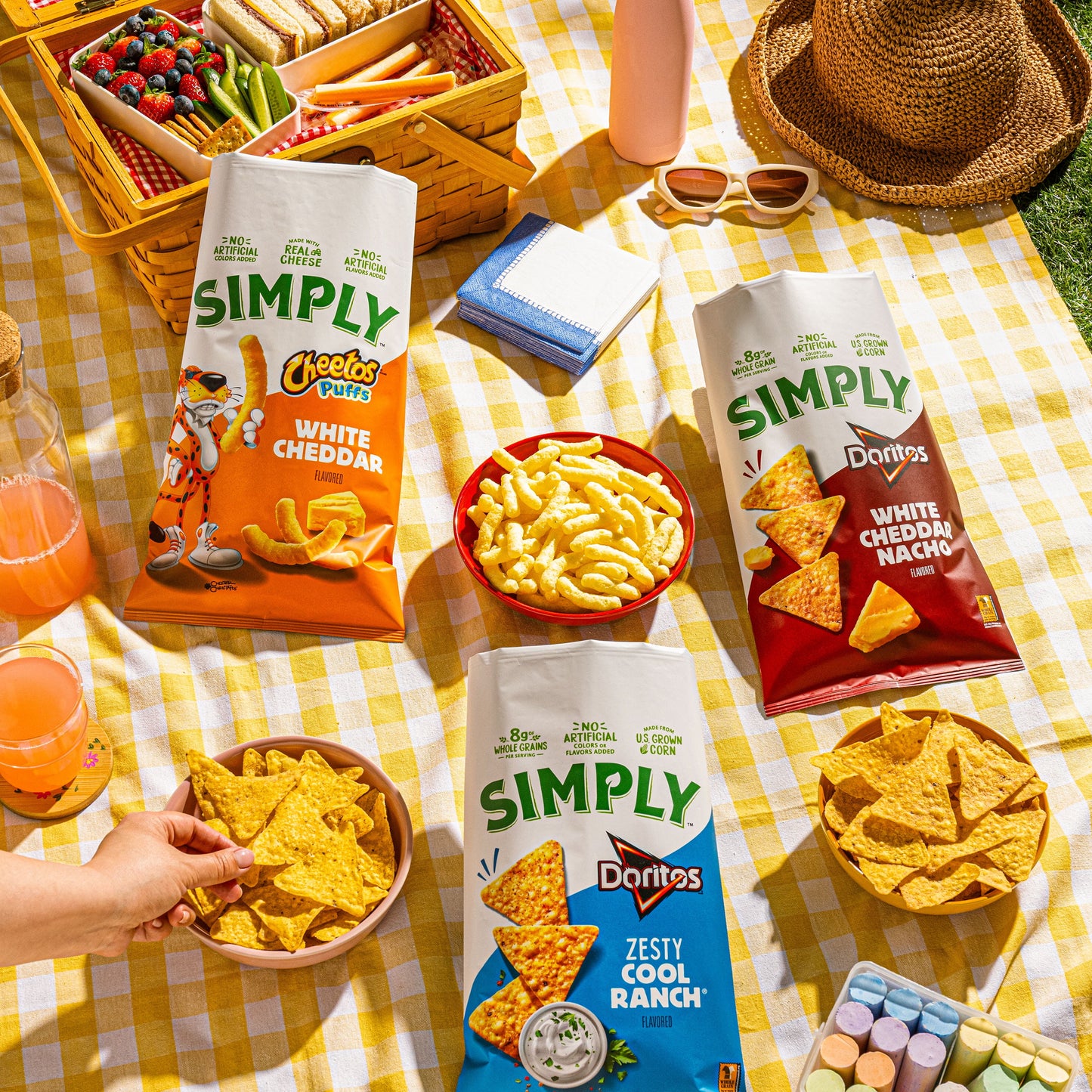 Pack of 36 Simply Cheetos Puffs White Cheddar cheese flavored snack chips in 0.875 oz bags, crunchy cheesy snack multipack