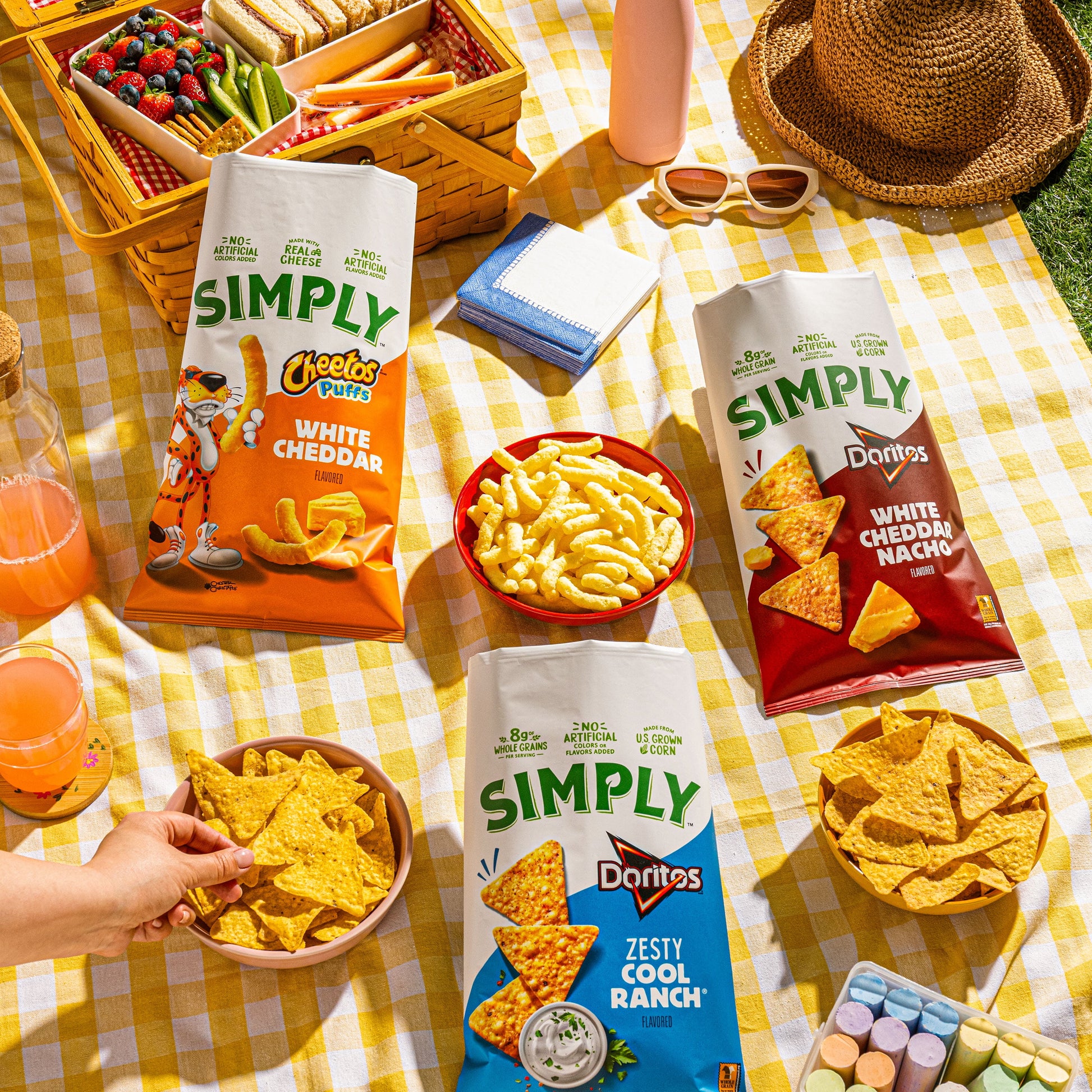 Pack of 36 Simply Cheetos Puffs White Cheddar cheese flavored snack chips in 0.875 oz bags, crunchy cheesy snack multipack