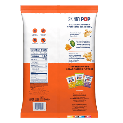 Skinnypop Gluten-Free Cheddar Jalapeno popcorn in a 4.4 oz sharing bag, healthy snack with spicy cheese flavor