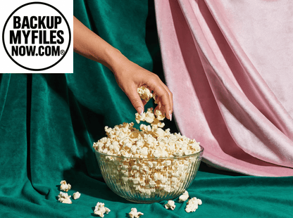 SkinnyPop gluten-free sea salt microwave popcorn snack multipack, 12 packs of 2.8 oz each, with golden popcorn in a box.